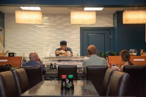 Preparing sushi at Sake Sushi